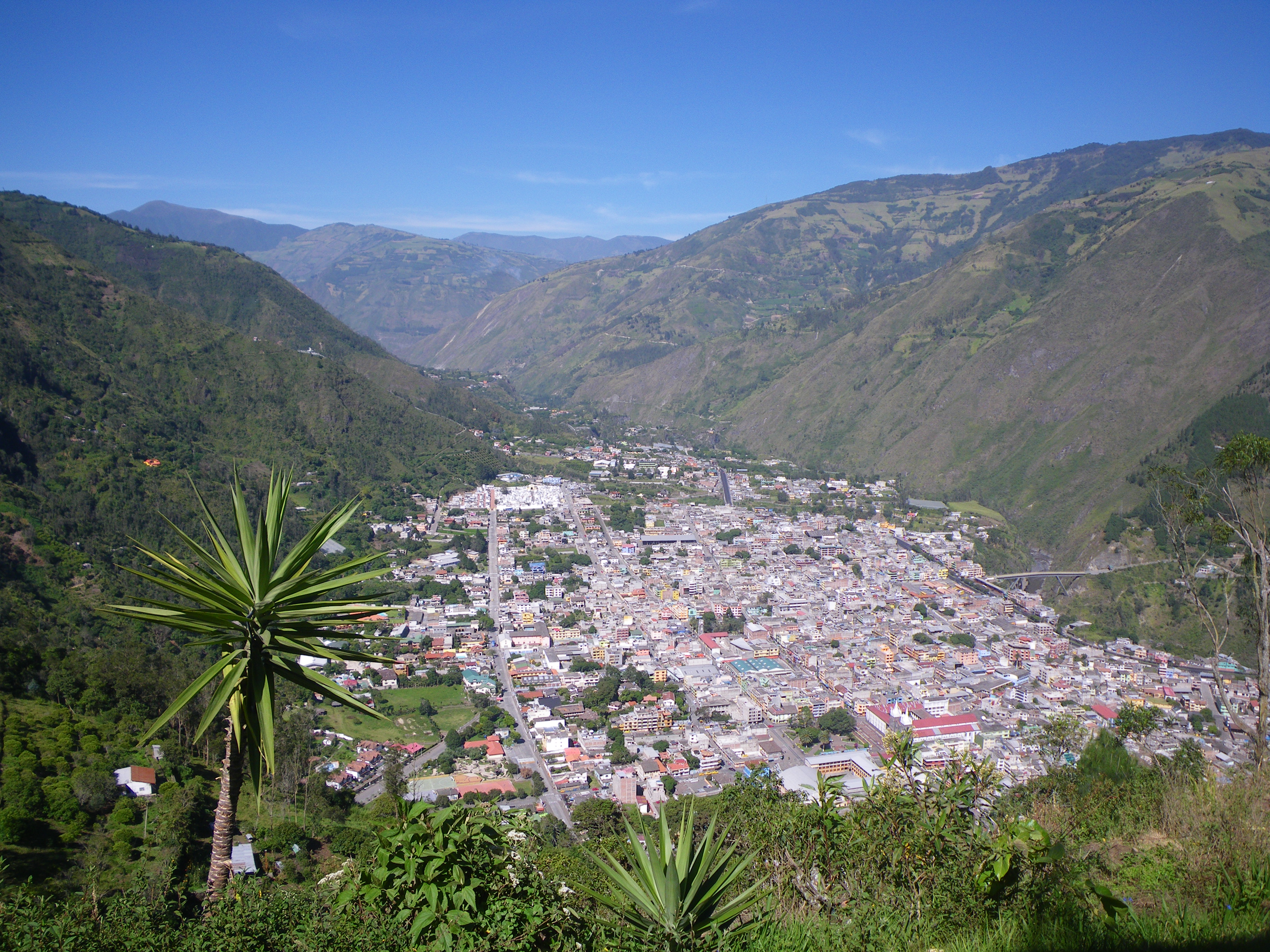 Aerial view of Banos, a city surrounded by forest and mountains