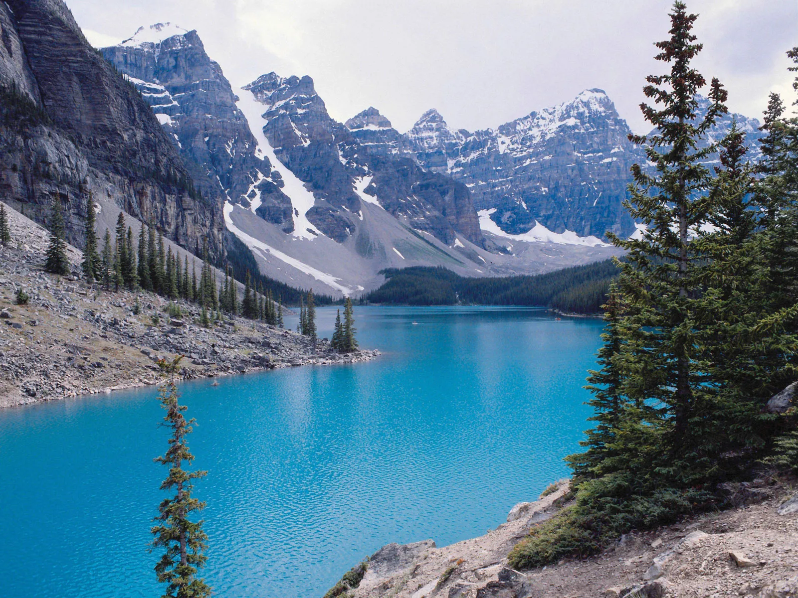 Mountains surrounding the blue waters of Lake Lorraine, Banff