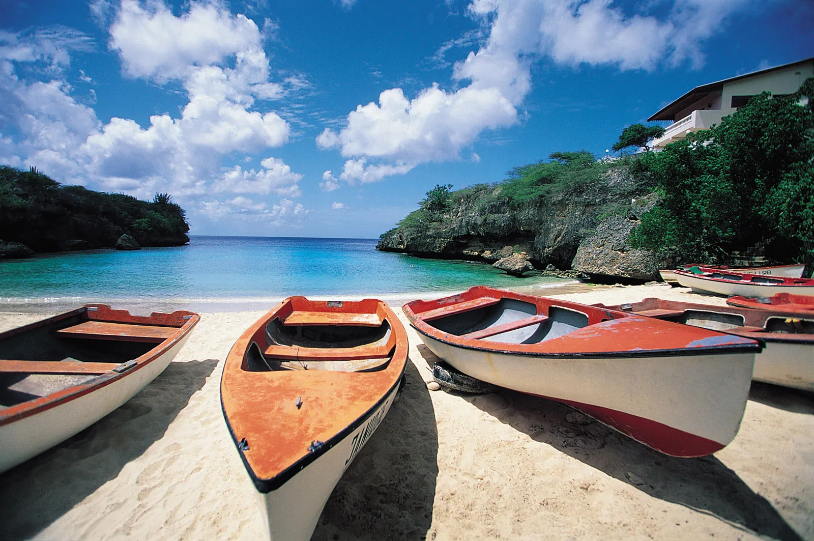 Canoes on a beach in Curacao