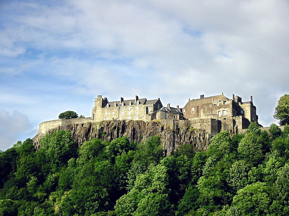 A photograph of Stirling Castle, in Stirling, Scotland. This photo was taken by Finlay McWalter at 5:26 p.m. on July 11, 2002. The view is from the King's Knot area, looking roughly northward to the castle.